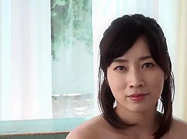 Pretty Japanese woman with big tits showing off her panties JAV