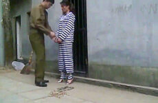 Chinese Prison Girl in Metal Bondage